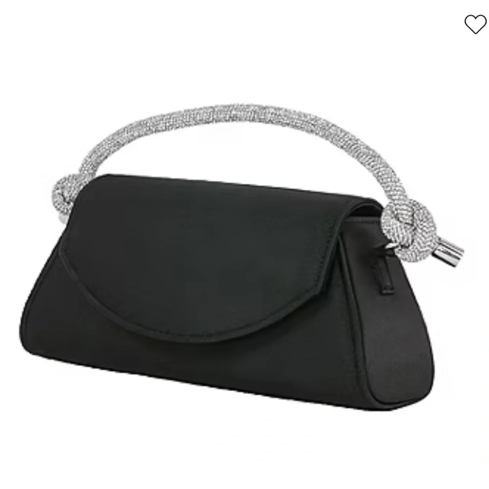 black evening bag features a distinctive sparkly, twisted knot strap.